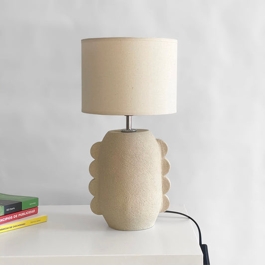 unglazed porous white clay desk lamp, ideal for decorating a corner of a home.